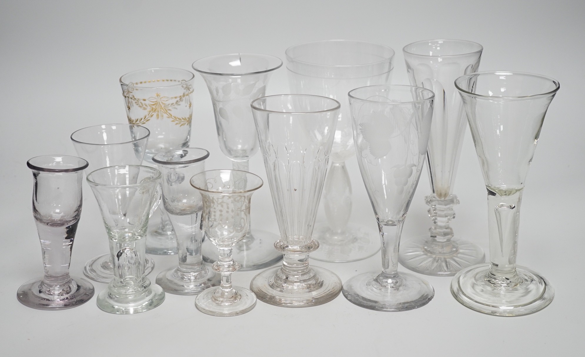 A quantity of 18th century and later glasses, tallest 18cms high